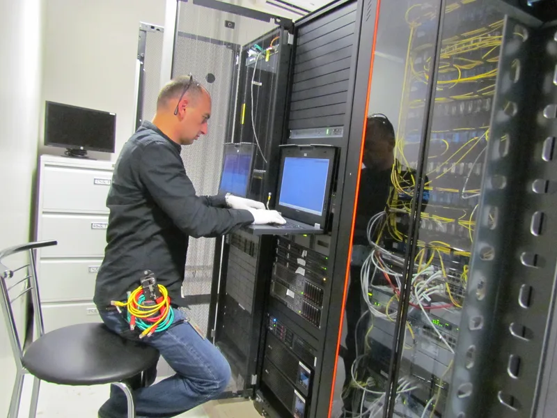 ICRS Service engineer working at a server rack